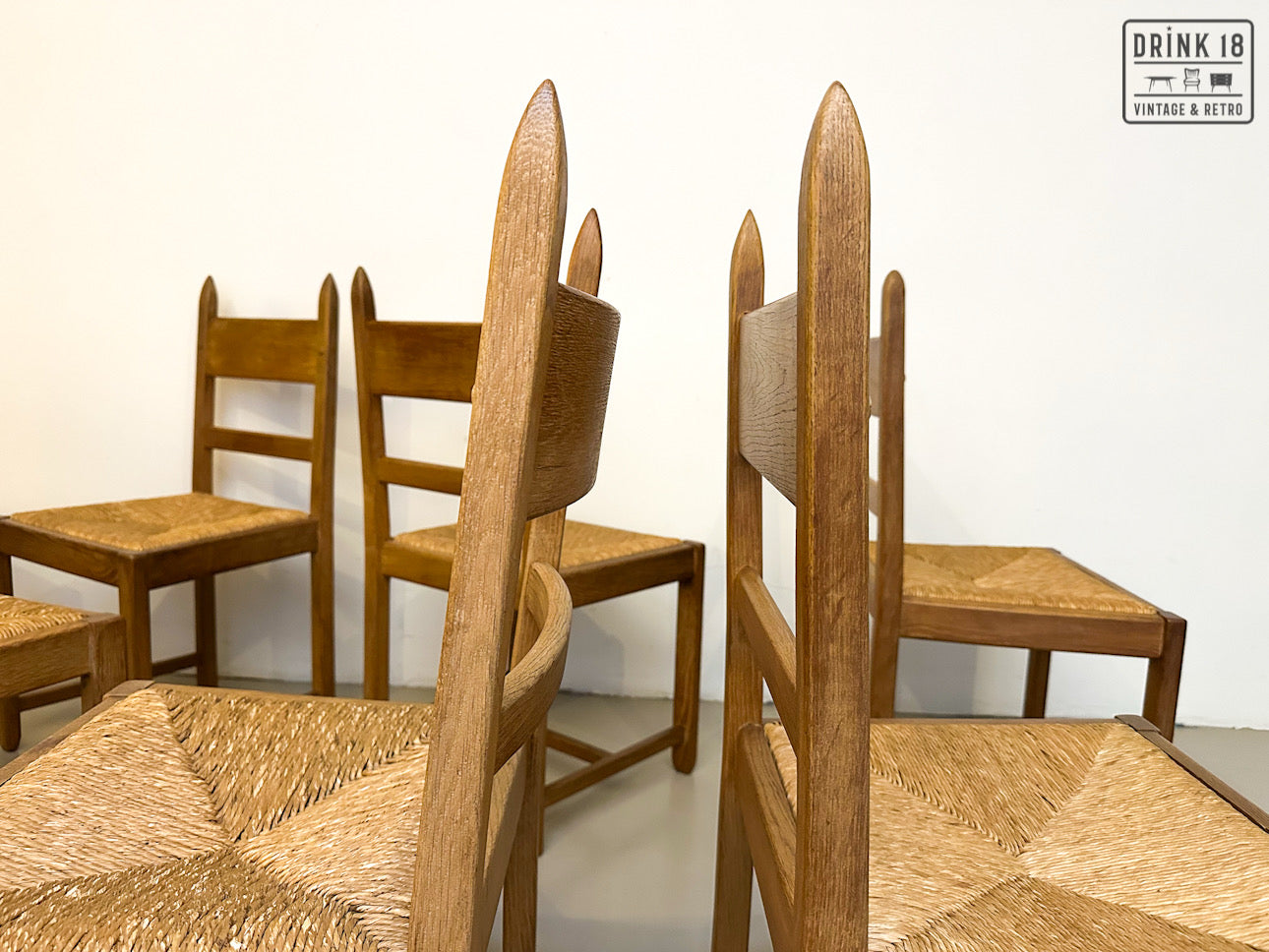 Brutalist - Set van acht eetkamerstoelen met gevlochten zitting