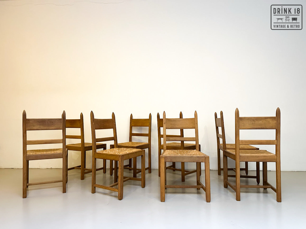 Brutalist - Set van acht eetkamerstoelen met gevlochten zitting
